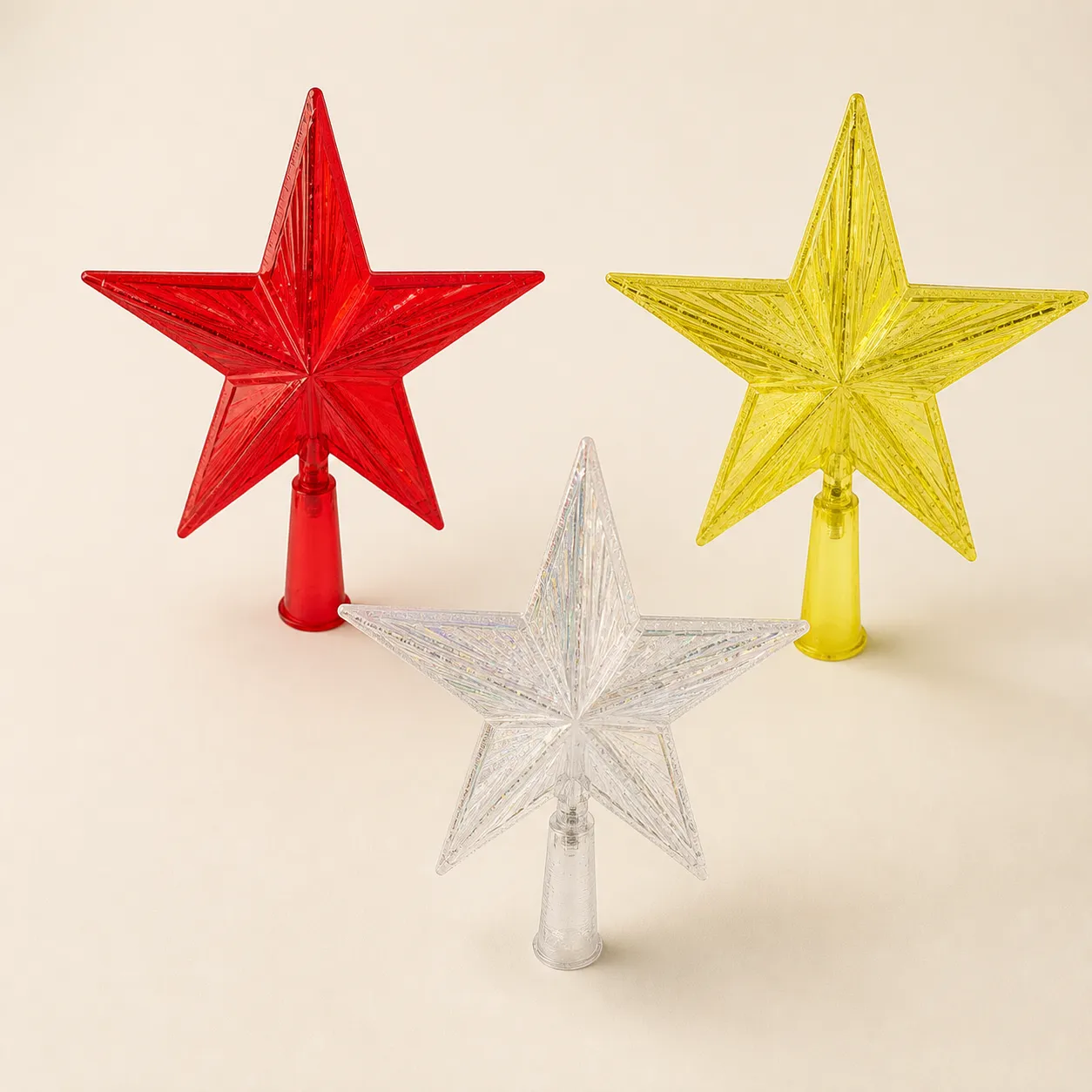 Estrelas decorativas de Natal em vermelho, amarelo e prata para topo de árvore